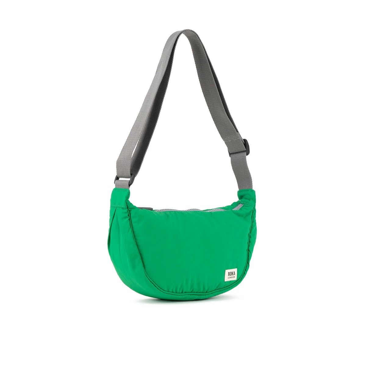 Roka Farringdon Crossbody bag in Amazon Green Side. Available at Lotta from Stockholm