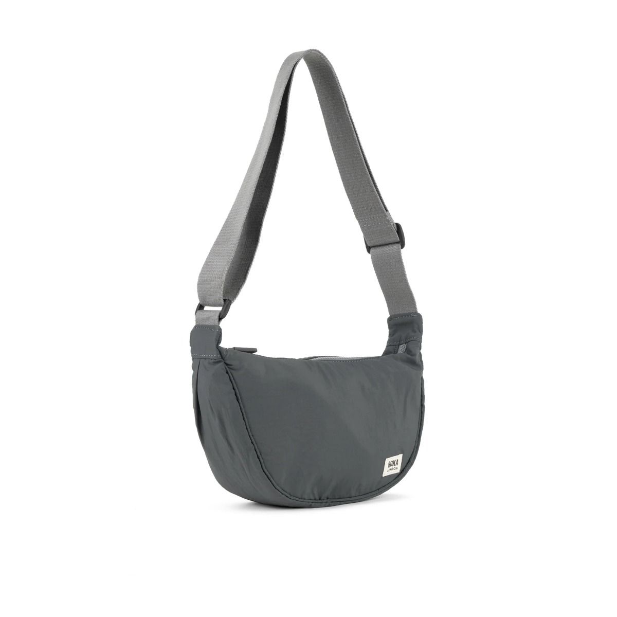 Roka Farringdon Crossbody bag in Charcoal side. Available at Lotta from Stockholm