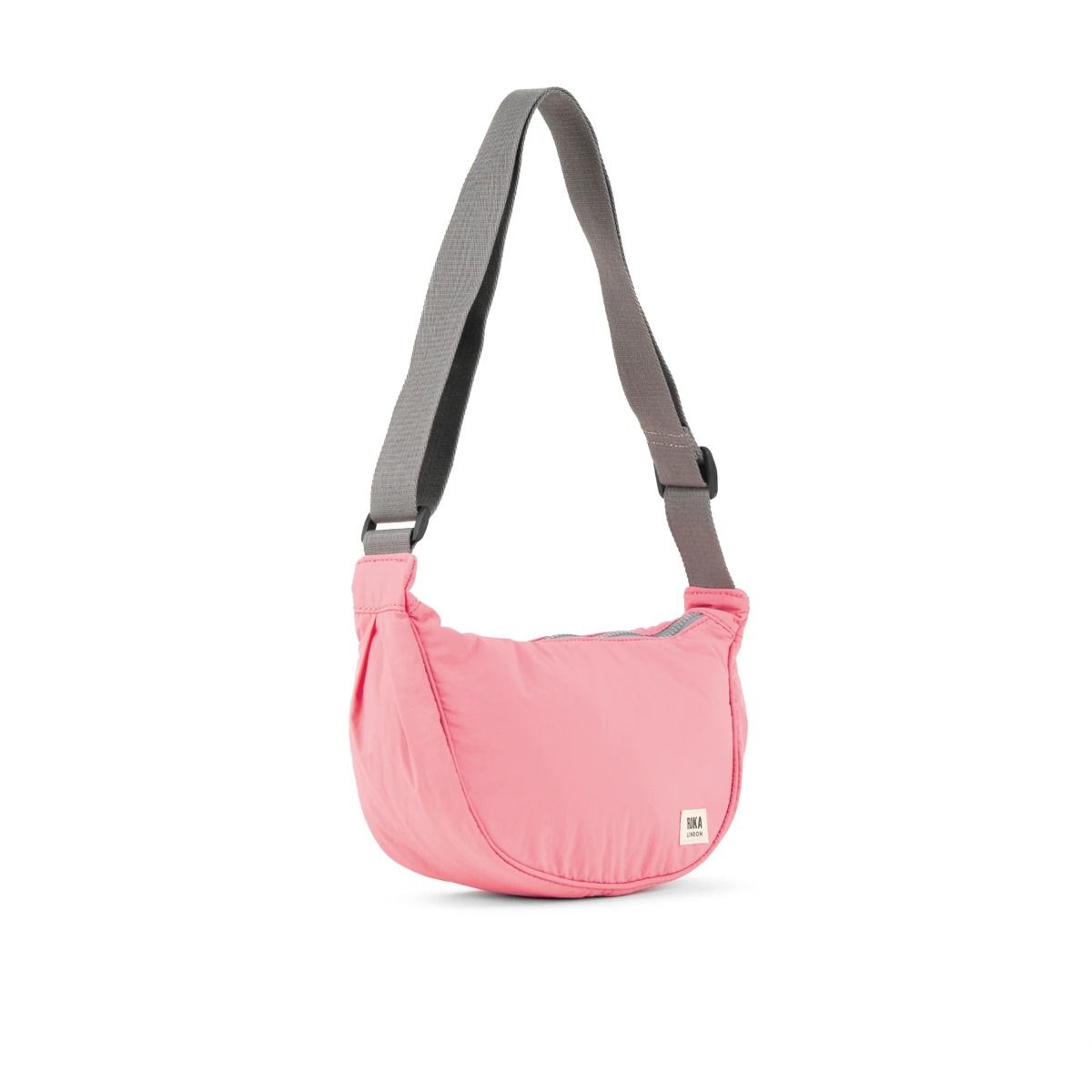 Roka Farringdon Crossbody bag in Rose side. Available at Lotta from Stockholm